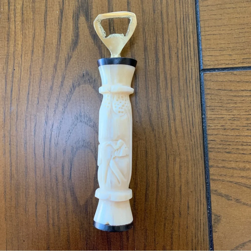 Bone carved bottle opener
